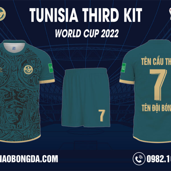 Hình ảnh Áo Tunisia World Cup 2022 Bộ Thứ Ba Màu Xanh Liver Tự Thiết Kế Độc Đáo. Với việc sử dụng màu xanh liver đậm làm màu chủ đạo cho áo đấu mang đến sự mới lạ, tươi mát cuốn hút mọi ánh nhìn. Độc đáo với bản họa tiết trên mặt trước áo với những hoa văn cùng vị thần Ai Cập cổ điển thần thoại có màu camo napoli. Thiết kế cổ áo tròn cùng ống tay áo raglan và các đường bo tay bo đuôi áo, các chi tiết tinh tế khác có màu vàng mỡ gà nhạt đã hoàn thiện vẻ bề ngoài áo đấu hài hòa đầy cuốn hút. Shop Hacazi Sport đã tạo ra một sản phẩm thể thao bóng đá mới đầy ấn tượng dành cho mùa giải World Cup 2022 sắp tới.